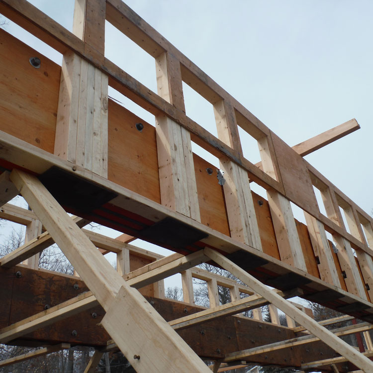 One of the flitch plate beams with the clerestory framing in place